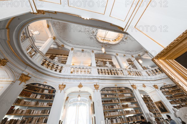 Magnificent baroque library with golden decorations and high bookshelves, Weimar, Germany, Europe