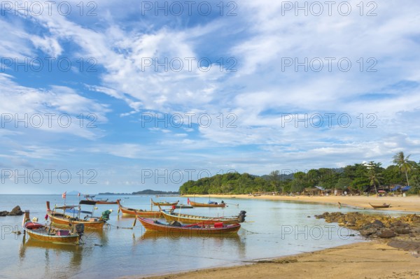 Longtail boats, fishing boats at Klong Khong beach, fishermen, sea, ocean, coast, seascape, coastal landscape, seashore, tropical, tropics, tropical beach, water, tropical island, island paradise, authentic, beach, empty, nobody, holiday, travel, tourism, island, beach holiday, sun, summer, asian, form of travel, beach holiday, Ko Lanta, Thailand, Asia
