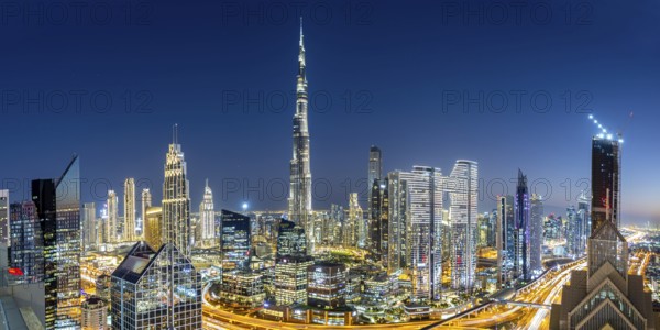 Burj Khalifa skyline tallest building in the world panorama from above in Downtown at night in Dubai, United Arab Emirates, Asia