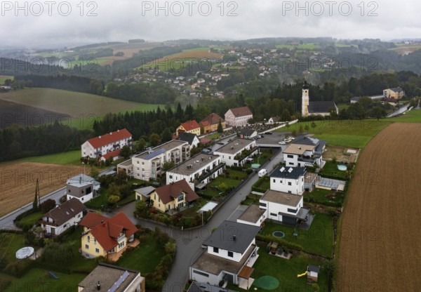 Drone image, residential buildings, view of village with church, Brunnenthal, Innviertel, Upper Austria, Austria, Europe