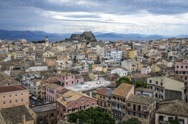 Corfu Town, Corfu, Greece, City overview Corfu Town with the Greek Orthodox Church of Agios Spiridon and the New Fortress. Back mainland Albania, Europe
