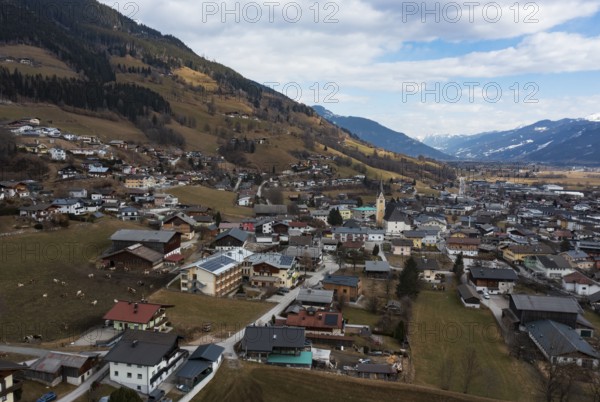 Drone shot, view of village with parish church, Piesendorf, Pinzgau, Salzburg province, Austria, Europe