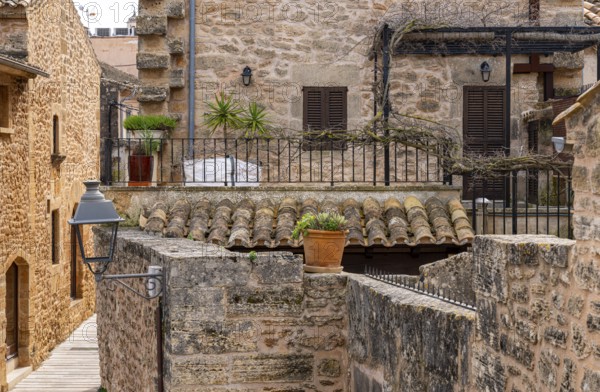 View of Mediterranean houses, roofs and courtyards from the town wall, Alcudia, Majorca, Spain, Europe