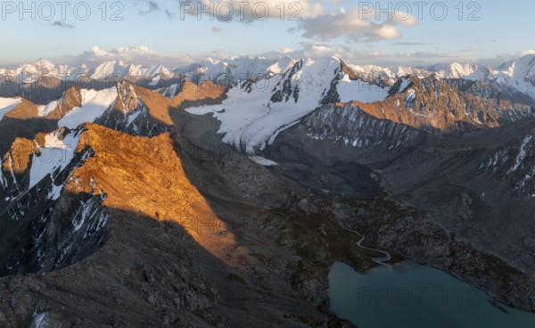 Evening mood, mountain panorama, aerial view, 4000 metre peak with glacier, mountain pass and mountain lake Ala-Kul Lake, Tien Shan, Kyrgyzstan, Asia