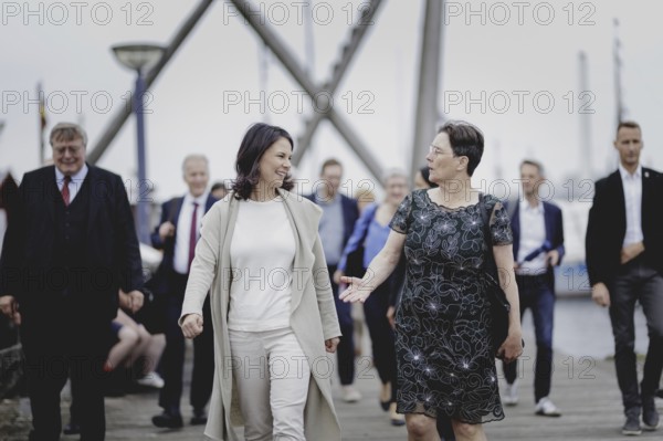 (L-R) Annalena Bärbock (Alliance 90/The Greens), Federal Foreign Minister, and Monika Heinold, Deputy Prime Minister and Finance Minister of Schleswig-Holstein, pictured during the trip to Germany in Flensburg, 25 July 2024. /