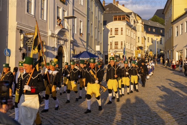 The so-called Bergstreittag is a beautiful centuries-old tradition and is celebrated on 22 July, the church memorial day and former feast day of Mary Magdalene in Schneeberg. The four quarterly sermons introduced in 1649 remained in place until 1845. These sermons were then abolished in favour of a single day, 22 July, which fell on Mary Magdalene. The Freiberg Mining Office recommended that this day should be celebrated with a festival and a mountain parade. In 1846, the Royal Ministry of Finance issued a decree to celebrate St Mary Magdalene's Day with a sermon and a magnificent mountain procession. The last major procession took place in July 1913. The First World War put an end to these processions. The tradition was not revived until July 1933, 528th Bergstreittag, mountain parade, Schneeberg, Saxony, Germany, Europe