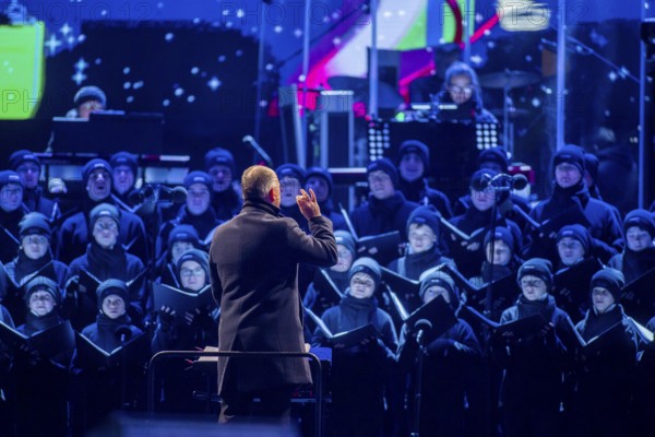 When over 25, 000 visitors flock to the Rudolf Harbig Stadium for the big Advent concert just in front of Christmas, the Christmas festivities begin for many Dresdeners. What began in 2015 as part of the celebrations to mark the anniversary of the world-famous Dresden Kreuzchor has now established itself as one of the biggest and most beautiful Christmas events in Germany. Kreuzkantor Ulrich Schicha, Dresden, Saxony, Germany, Europe