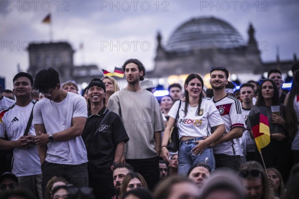 Scenes in the fan zone on Platz der Republik in front of the Reichstag building taken in Berlin, 29 June 2024 during the broadcast of the football match between Denmark and Germany