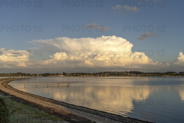 Sundsøre beach on the Limfjord with a view of Hvalpsund, Thise, Salling peninsula, Denmark, Europe