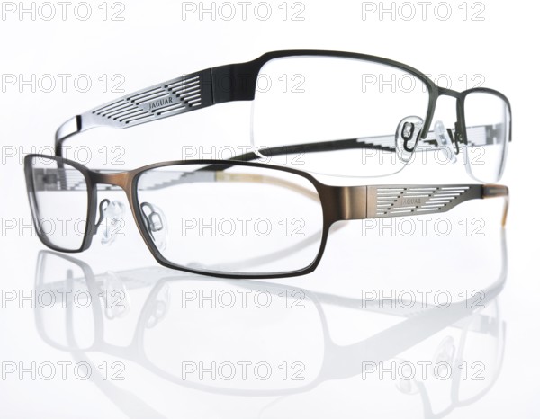 Two stylish glasses from JAGUAR on a white background, studio shot