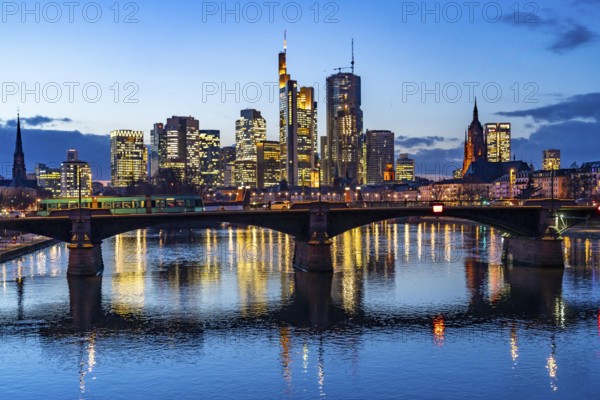 Skyline of the city centre of Frankfurt am Main, river Main, dusk, Ignatz-Bubis-Brücke, Hesse, Germany, Europe