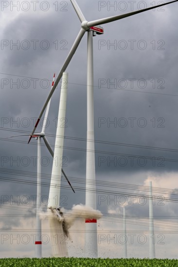 Demolition of the tower of a 20 year old wind turbine, in the Werl wind farm, 5 old Enercon E-66 turbines are demolished, 2 new Siemens SG6.6-170 wind turbines replace them, the 2 new wind turbines produce twice as much energy, 12 MW power, as the 5 old wind turbines, called repowering, Werl, North Rhine-Westphalia, Germany, Europe