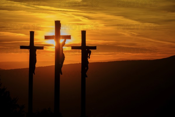 Sunset, crucifixion group, three crosses on the Kreuzberg in the Rhön, Kreuzberg near Bischofsheim, Rhön, Lower Franconia, Bavaria, Germany, Europe