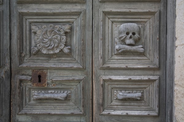 Detail of a wooden church door in Matera, Basilicata, Southern Italy, Italy, Europe