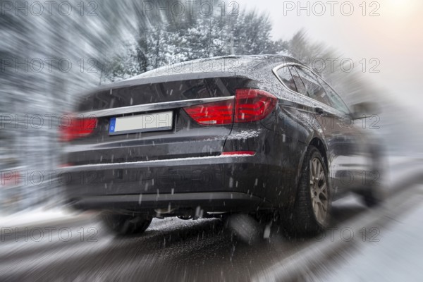 BMW on a snow-covered road (Composing)