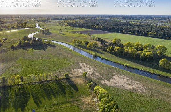 River Aller winding throug cultural landscape at Wienhausen east of Celle, mix of farmland, meadows and forest, Lower Saxony, Germany, Europe