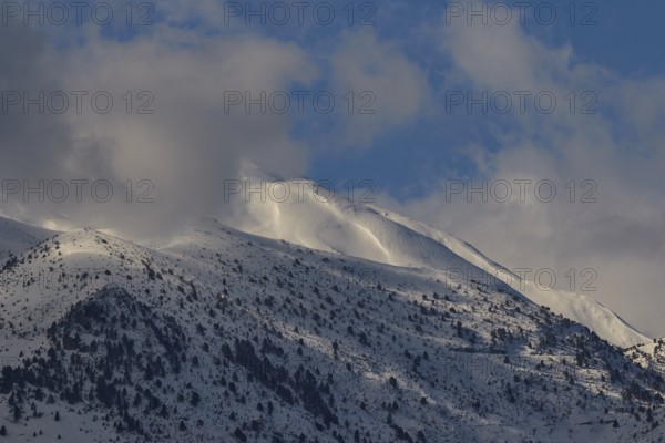 Snow-covered mountain peaks under a blue sky with few clouds, Lefka Ori, White Mountains, mountain massif, west, Crete, Greece, Europe