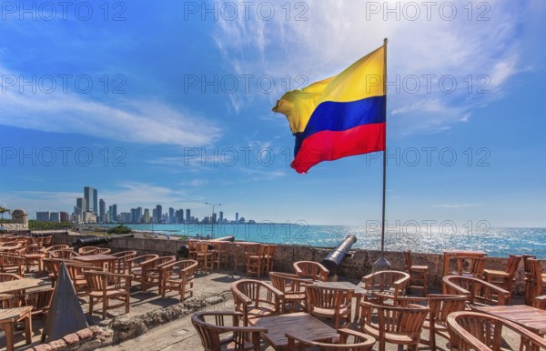 Street cafe in colonial Cartagena Walled City (Cuidad Amurrallada) overlooking scenic shoreline of Bocagrande and hotel zone