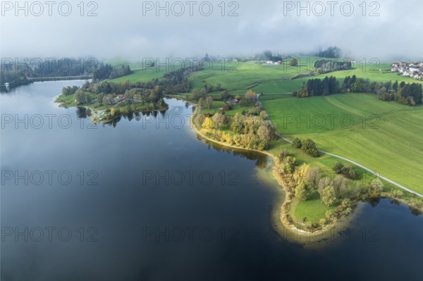 Sports facility and bathing area, lake Rottachsee, shore covered with fog, autumn, aerial view, Allgaeu, Bavaria, Germany, Europe