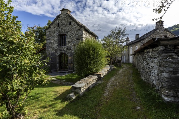 View of the village, typical Ticino stone houses in the mountain village of Rasa, Centovalli, Canton Ticino, Switzerland, Europe