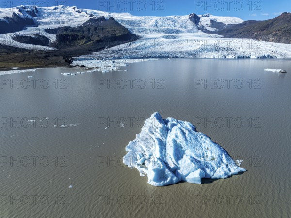 Aerial view over the glacial lake Fjallsárlón, glacier Fjallsjökull, part of Vatnajökull glacier, Iceland, Europe