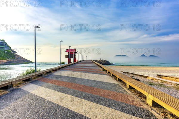 Breakwater pier on Barra da Tijuca beach in Rio de Janeiro at dawn Rio de Janeiro, RJ, Brazil, South America