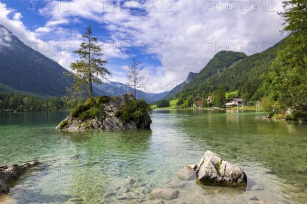 Hintersee near Ramsau with clear green water, surrounded by forests and mountains under a cloudy sky, Berchtesgaden National Park, Berchtesgadener Land, Upper Bavaria, Bavaria, Germany, Europe