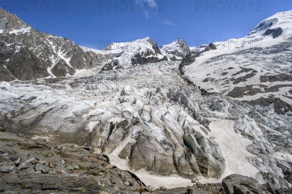 High alpine glaciated mountain landscape, La Jonction, Glacier des Bossons meets Glacier de Taconnaz, summit of Mont Maudit and Mont Blanc, Chamonix, Haute-Savoie, France, Europe