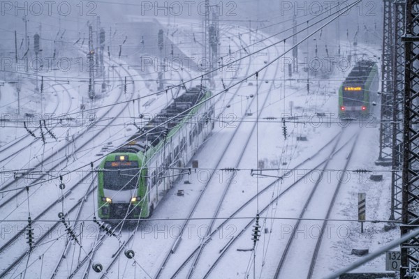 Winter weather, heavy snowfall, railway tracks in front of Essen main station, S-Bahn train, North Rhine-Westphalia, Germany, Europe
