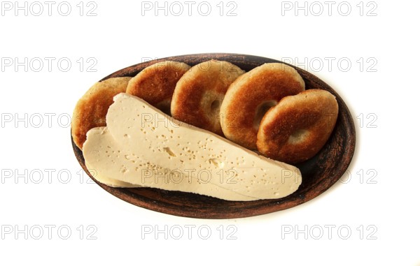 Mchadi, corn tortillas, traditional Georgian dish, corn bread, with Imeretian cheese, homemade, no people, on a light background