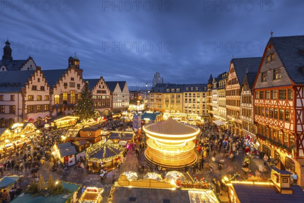 The carousel on the Römerberg turns. The Frankfurt Christmas Market was officially opened on 25 November 2024 when the lights on the Florian Christmas tree, a 26-metre-high spruce from Lower Franconia, were switched on. The Christmas market will be open until 22 December from Monday to Saturday from 10:00 am to 9:00 pm and on Sundays from 11:00 am to 9:00 pm. Frankfurt am Main, Römerberg, Hesse, Germany, Europe