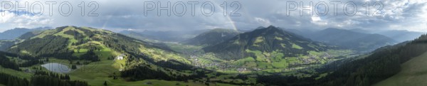 Alpine panorama in summer, rainbow, view over the Brixen valley, Hochbrixen, Brixen im Thale, Kitzbühel Alps, Tyrol, Austria, Europe