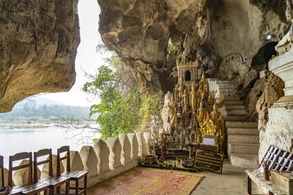 Buddha statues in the Pak Ou caves near Luang Prabang, Laos, Asia