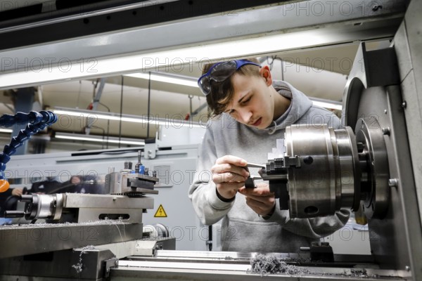 Remscheid, North Rhine-Westphalia, Germany - Trainees in metal professions, here at a machine tool, Vocational Training Centre of the Remscheid metal and electrical industry. - FOR EDITORIAL USE ONLY!
