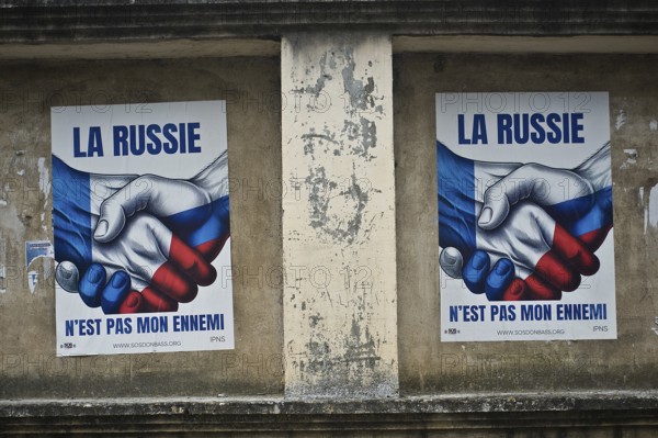 Political posters written in french language, La Russie n est pas mon ennemi (i.e. Russia is not my enemy), Poitou region, France. French language incorrect spelling, proper spelling is La Russie n est pas mon ennemie