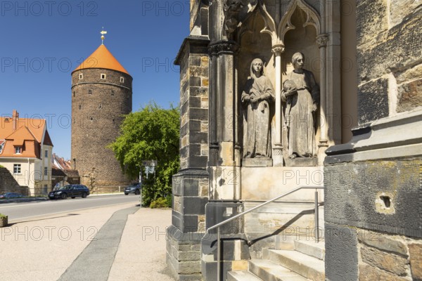 Donatsturm and entrance to the Jakobikirche with figures of Maria and Matha, Freiberg, Saxony, Germany, Europe