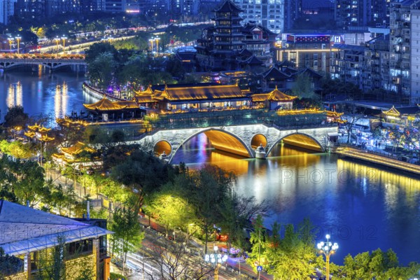 Chengdu skyline with Anshun Bridge over Jin River at night in Chengdu, China, Asia
