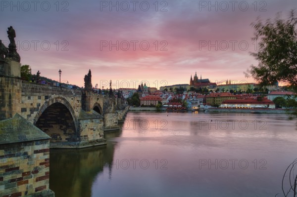 View over the Vltava River to the Hradcany, evening mood, Charles Bridge, Prague, Czech Republic, Europe