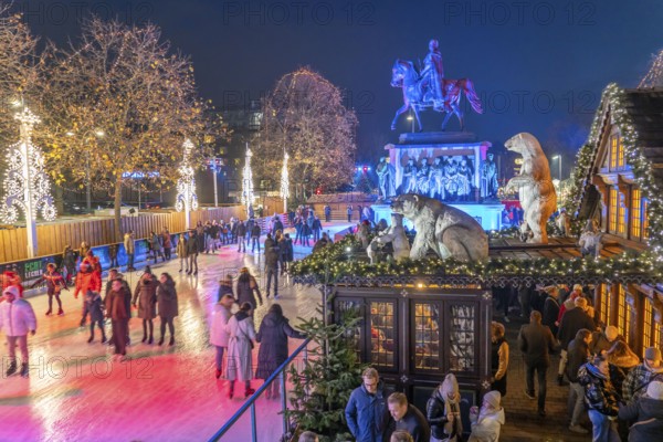 Christmas market with ice rink at Heumarkt, in the historic city centre of Cologne, North Rhine-Westphalia, Germany, Europe