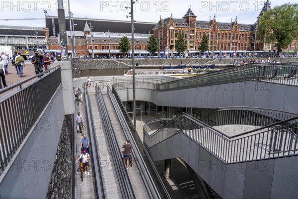 New bicycle car park at Amsterdam Central Station, Stationsplein, space for around 7000 bicycles, largest in Amsterdam, digitally monitored, underground, direct connection to the station and metro, Netherlands, escalators lead to the bicycle garage, Netherlands