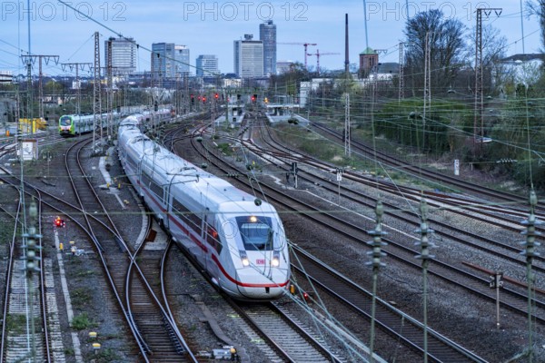 Train on the tracks west of Essen central station, skyline of the city centre, ICE train, North Rhine-Westphalia, Germany, Europe