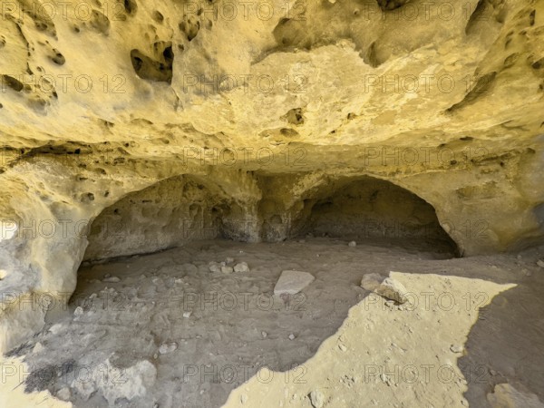Cave of former Roman necropolis with burial caves carved in sandstone Cave tombs Grottoes in rocks on the north side of Matala Bay, in 60s and 70s hippie caves Caves for dropouts and hippies today excursion destination on the south coast of Crete, Matala, Crete, Greece, Europe