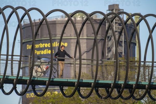 Bridge Slinky Springs to Fame, Gasometer, Cycling in the Ruhr area, Halde Franz, Haldenzeichen, orange, snail shell-shaped observation tower, Hamm, North Rhine-Westphalia, Germany The Gasometer Oberhausen, Slinky Springs to Fame Bridge over the Rhine-Herne Canal, North Rhine-Westphalia, Germany, Europe