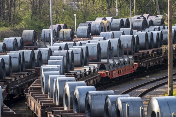Strip steel coils, on freight wagons, at the ThyssenKrupp Schwelgern plant in Duisburg-Marxloh is part of the Bruckhausen steelworks, North Rhine-Westphalia, Germany, Europe