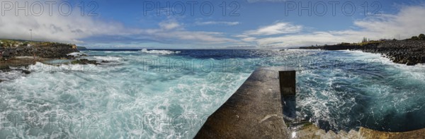 Former whale towing facility in stormy sea with waves and clouds in the sky, whale station and factory, Capelas, Sao Miguel Island, Azores, Portugal, Europe