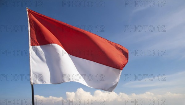 The flag of Indonesia flutters in the wind