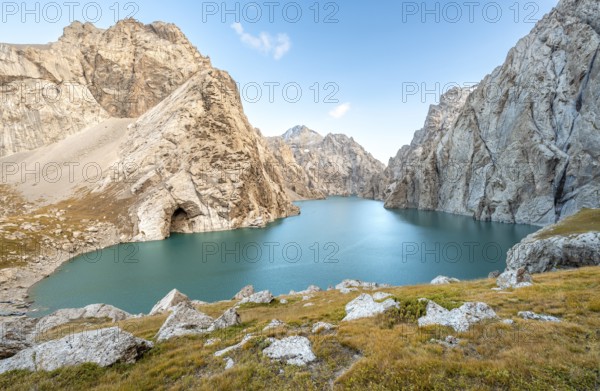 Turquoise mountain lake Kol Suu with rocky steep mountains, Kol Suu Lake, Sary Beles Mountains, Naryn Province, Kyrgyzstan, Asia
