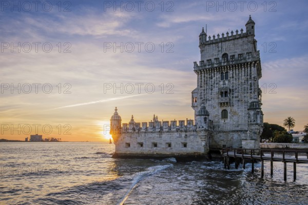 Belem Tower or Tower of St Vincent, famous tourist landmark of Lisboa and tourism attraction, on the bank of the Tagus River Tejo on sunset. Lisbon, Portugal, Europe
