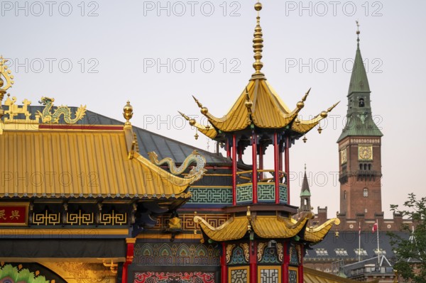 Building, Chinese architecture with pavilion in front of town hall tower, Tivoli amusement and recreation park, Copenhagen, Denmark, Europe