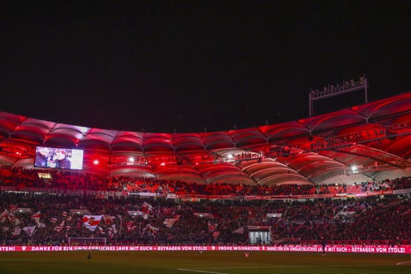 Christmas greetings for fans after Bundesliga football match, VfB Stuttgart versus FC St. Pauli, evening, red illuminated, Cannstatter Kurve, fan block, fans, fan curve, flags, flags, mood, atmospheric MHPArena, MHP Arena Stuttgart, Baden-Württemberg, Germany, Europe